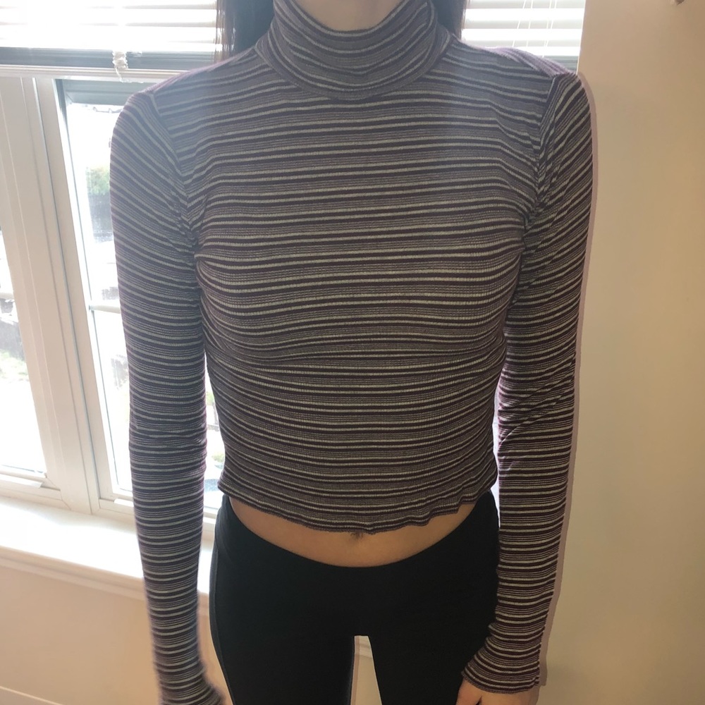 White&red striped turtleneck.